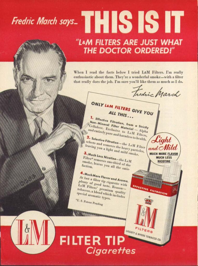Propaganda da marca de cigarros L&M nos Estados Unidos em 1958. A mensagem do garoto-propaganda, o ator Fredric March, diz que os "filtros da L&M são aquilo que os médicos recomendam" - a despeito de já existirem estudos na época indicando a ineficiência dos mesmos.